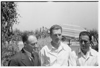 Russian aviators meet the press after breaking the non-stop flight record, flying from Moscow to San Jacinto, CA. July 14, 1937