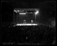 Joe Louis vs Jack Roper boxing match with surrounding crowd at Wrigley Field, Los Angeles, Calif, 1939