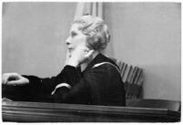 Evangelist Aimee McPherson appearing in court to confront a suit brought against her, Los Angeles, 1935