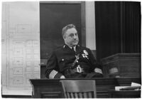 Police Chief James E. Davis testifying before the grand jury about the attempted murder of Harry Raymond, Los Angeles, 1938