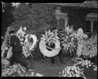 Shrine of flowers around Jean Harlow's home after her death, Los Angeles, 1937