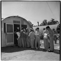 Veterans lined up to purchase Quonset huts and other surplus military supplies, Port Hueneme, July 15, 1946