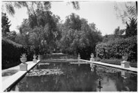 Reflecting pool on the estate of film comedian Harold Lloyd and his wife Mildred, Beverly Hills, 1927