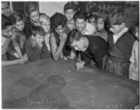 14-year-old Ray Charlton, the Marble Champion of Los Angeles, 1937