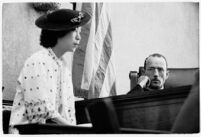 Myrtle Takaoka, sister of slain dancer, testifies in court with Judge Irvin Taplin presiding, Los Angeles, 1936