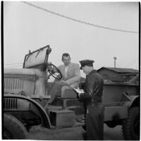 George Roberts purchases the first truck sold at the War Assets Administration's surplus sale, Port Hueneme, May 1946