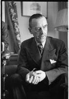 German author Thomas Mann seated in a chair, Los Angeles