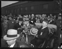 President Franklin D. Roosevelt, Eleanor Roosevelt, and Mayor Frank L. Shaw at start of motorcade, Central Station, Los Angeles, October 1, 1935