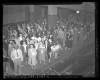 Crowd waiting on Pacific Electric Railway platform during 1946 Los Angeles Transit Lines strike