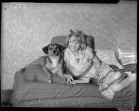 Marie Wright poses with dog Rex, Los Angeles, 1930s