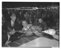 Wrestler Dean Detton at the side of the ring during a match against Bronko Nagurski at Olympic Auditorium, Los Angeles, 1937-1938