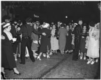 Police regulate the crowd at a movie premiere, Los Angeles