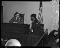 Coroner Frank Nance listens to a testimony from Leona Navy at the Paul A. Wright inquest, Los Angeles, November 12, 1937