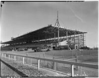 Construction on the grandstand at Santa Anita Park which would enlarge the capacity by 3000 to 5000 seats, Arcadia, 1930s