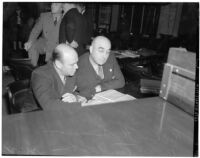 Chief liquor control officer Merle Templeton with his attorney Richard H. Sampson at the liquor license bribe trial, Oct 1939 - May 1940