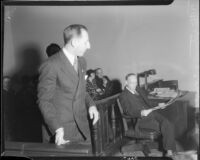 Los Angeles County District Attorney Buron Fitts arrives in courtroom, circa 1935