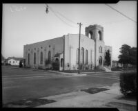 Exterior view of facade and and side of the First Baptist Church of Inglewood, circa 1924