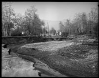 Men work to repair part of the La Crescenta Highway after storm damage. December 31, 1933