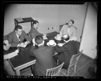 Congressman Martin Dies with reporters during break in Los Angeles hearing of House Committee on Un-American Activities, 1940