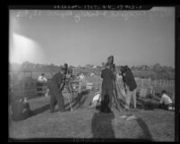 Cameramen and soundmen filming Mary Pickford and Charles Buddy Rogers on ranch in California, 1936