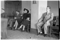 Private detective Pearl Antibus appears in court with her daughter Norma Thelan and son Robert Antibus during her trial against millionaire Thomas W. Warner, Sr, Los Angeles, 1938