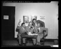 Stephen L. Wells, E. George Luckey, Frank Scriven and Virgil Backer at Democratic headquarters in Los Angeles, Calif., 1948