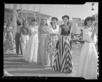 Models lined up for fashion show at opening of the Fairmont Miramar Hotel pool in 1941, Santa Monica, Calif