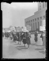 Women pickets protesting the World War II draft in Los Angeles, Calif., 1940