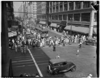 Crowds of shoppers taking advantage of bargains on Dollar Day in downtown Los Angeles, September 11, 1937