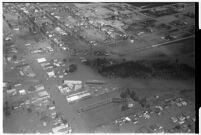 Aerial view of flooded neighborhoods and crops in North Hollywood, Los Angeles, 1938