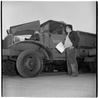 Manuel Sanchez at the War Assets Administration's surplus truck and trailer sale, Port Hueneme, May 1946