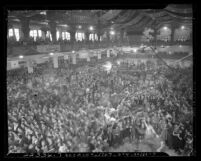 Overhead view of crowded auditorium during Jitterbug Dance contest Los Angeles, Calif., 1939