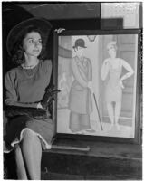 Roma Nicolais poses next to a painting by Dr. A. A. LaVinger titled, "The Bargain," Los Angeles