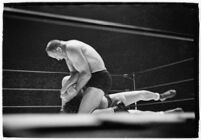 Wrestlers "Daniel Boone" Savage and Hans Steinke battle it out at the Grand Olympic Stadium. June 16, 1937