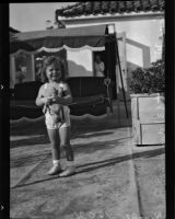 Helen Wright, three-year-old daughter of Paul A. Wright, who is accused of the double murder of his wife and best friend, Los Angeles, November 1937