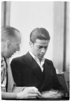 Louis Rude Payne and Dist. Atty. Buron Fitts at Payne's inquest for the murder of his mother and younger brother, Los Angeles, June 6, 1934