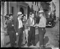 Craft workers on strike stand outside Paramount Pictures, Los Angeles, 1937