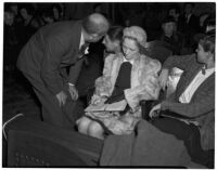 Dr. George K. Dazey and his third wife, Dorcas Dazey, at the trial where Dr. Dazey is accused of the murder of his second wife, Doris S. Dazey, Los Angeles, 1939-1940