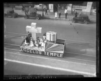 Angelus Temple parade float with Four Square Gospel insignia and a huge Bible, Los Angeles, 1935