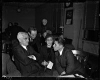 Joseph Scott, Giles Knight, Aimee Semple McPherson, and Rolf Kennedy McPherson at a slander trial, Los Angeles, April 1937