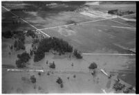 Aerial view of flooded crops and homes in North Hollywood, Los Angeles, 1938