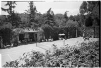 Tennis court on the estate of film comedian Harold Lloyd and his wife Mildred, Beverly Hills, 1927