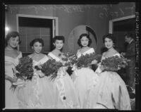 Nisei festival queens pose with flowers in Little Tokyo, Los Angeles, 1953