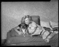 Marie Wright poses with dog Rex, Los Angeles, 1930s