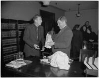 Former Ku Klux Klan Kleagle, Ray J. Schneider, and Attorney General Robert W. Kenny at trial, Los Angeles, 1946