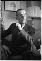 German author Thomas Mann seated in a chair, Los Angeles