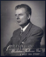 Aldous Huxley portrait, profile with arms crossed [descriptive]