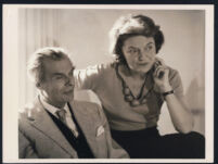 Aldous and Laura Huxley, seated looking off to right [descriptive]