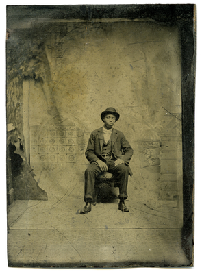 Portrait of man sitting in chair