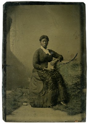 Portrait of woman posed with book